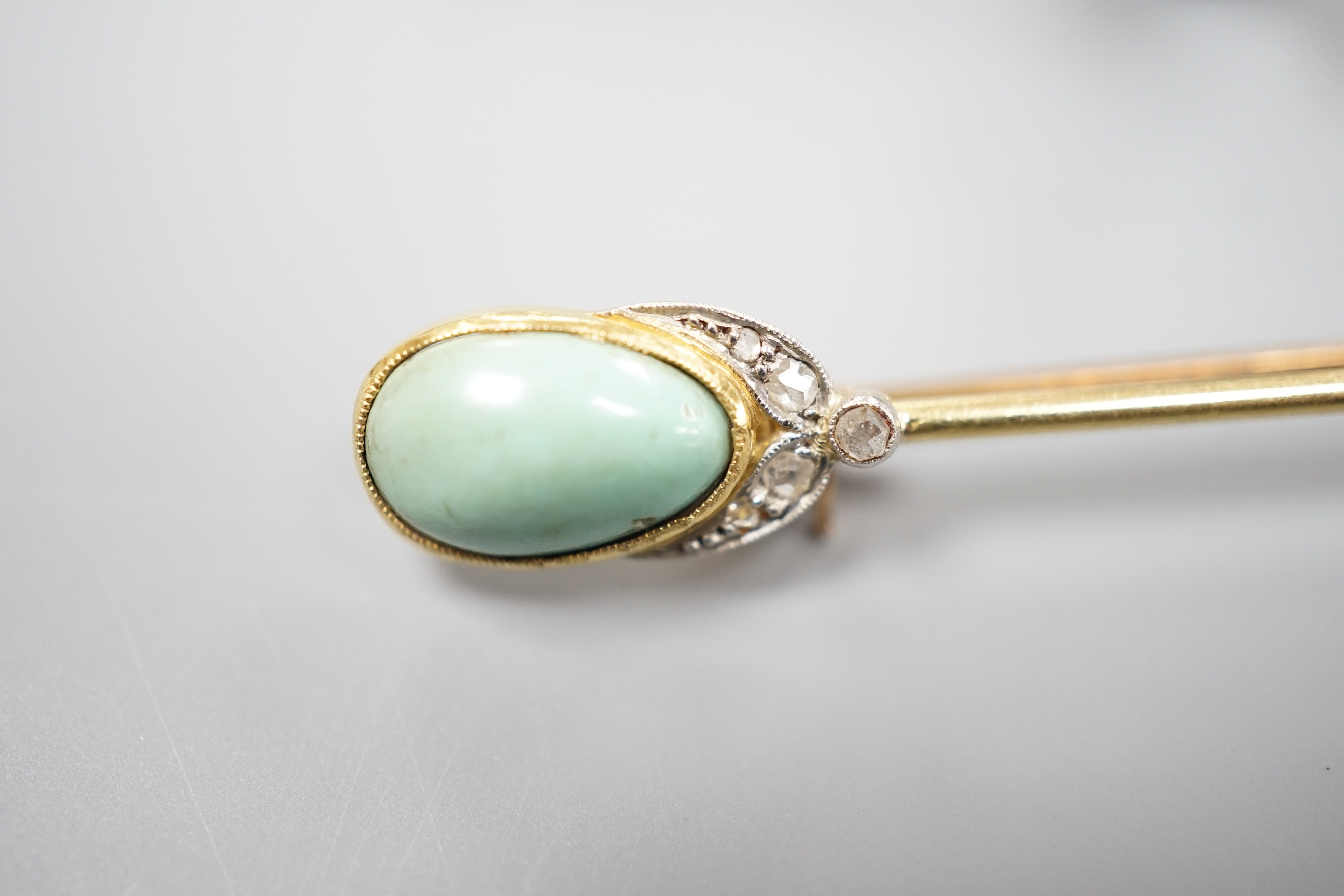 A yellow and white metal, rose cut diamond set fox head bar brooch, 62mm and a yellow metal, rose cut diamond and turquoise set bar brooch, gross weight 11.6 grams.